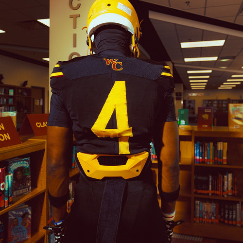 NXTRND B-PLATE® Pro Football Back Plate Yellow